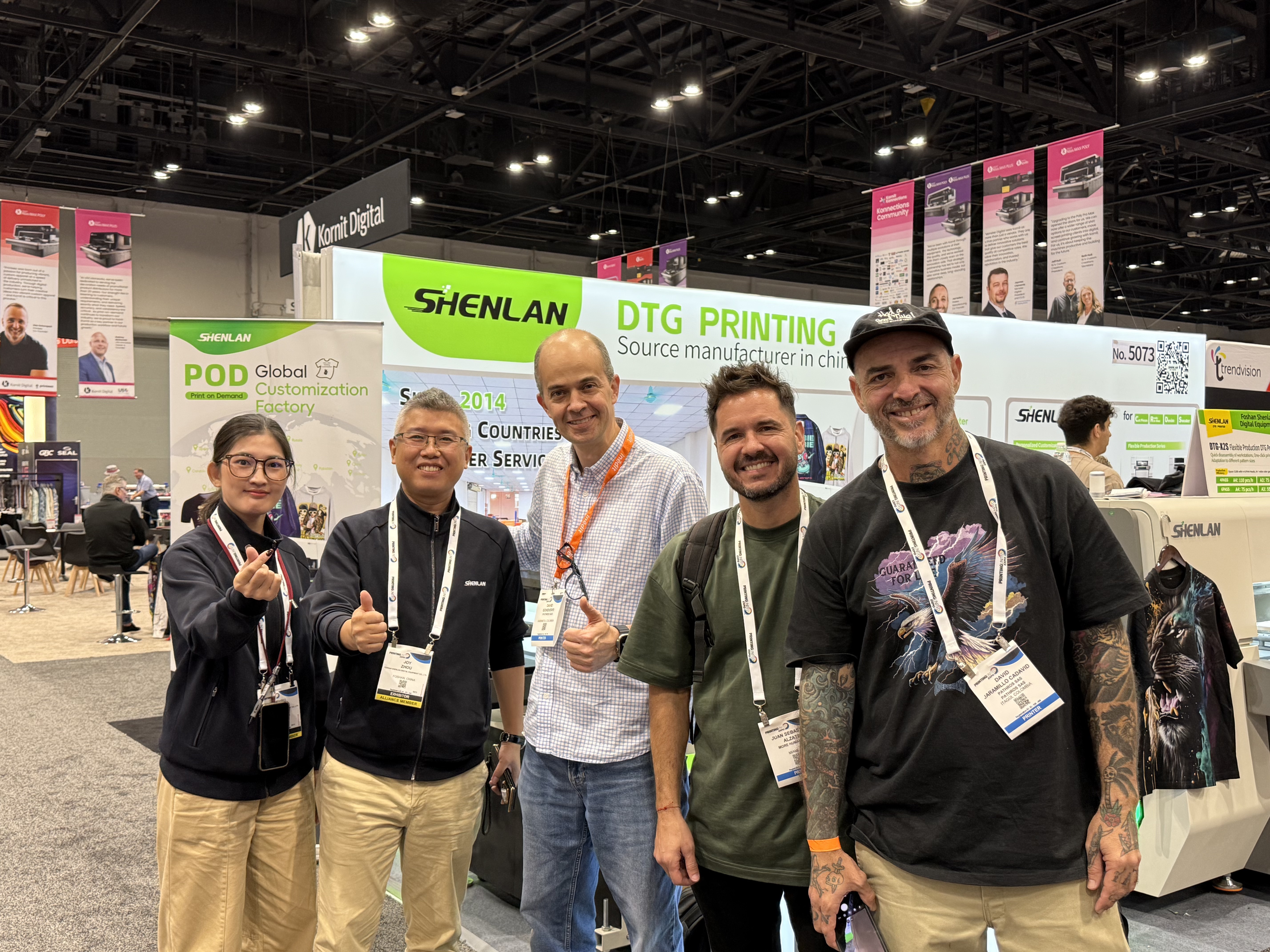 SHENLAN team with global partners at an exhibition